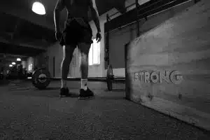 Man about to weight lift after using hgh peptides